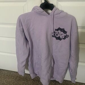 Area 15 merch clown laugh now cry later future fantasy delight lavender sweater